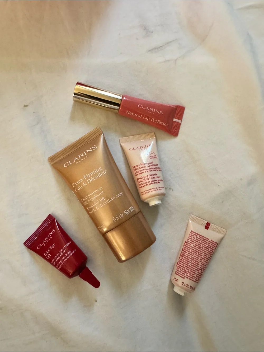 Clarins Skincare 7pc Set in red velvet travel bag NWOT